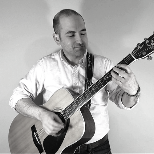 Picture of Joe Wachter playing guitar